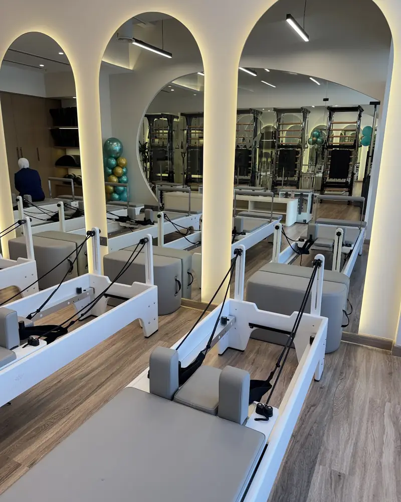 Reformers ready for class at Pilates Academy Arjan